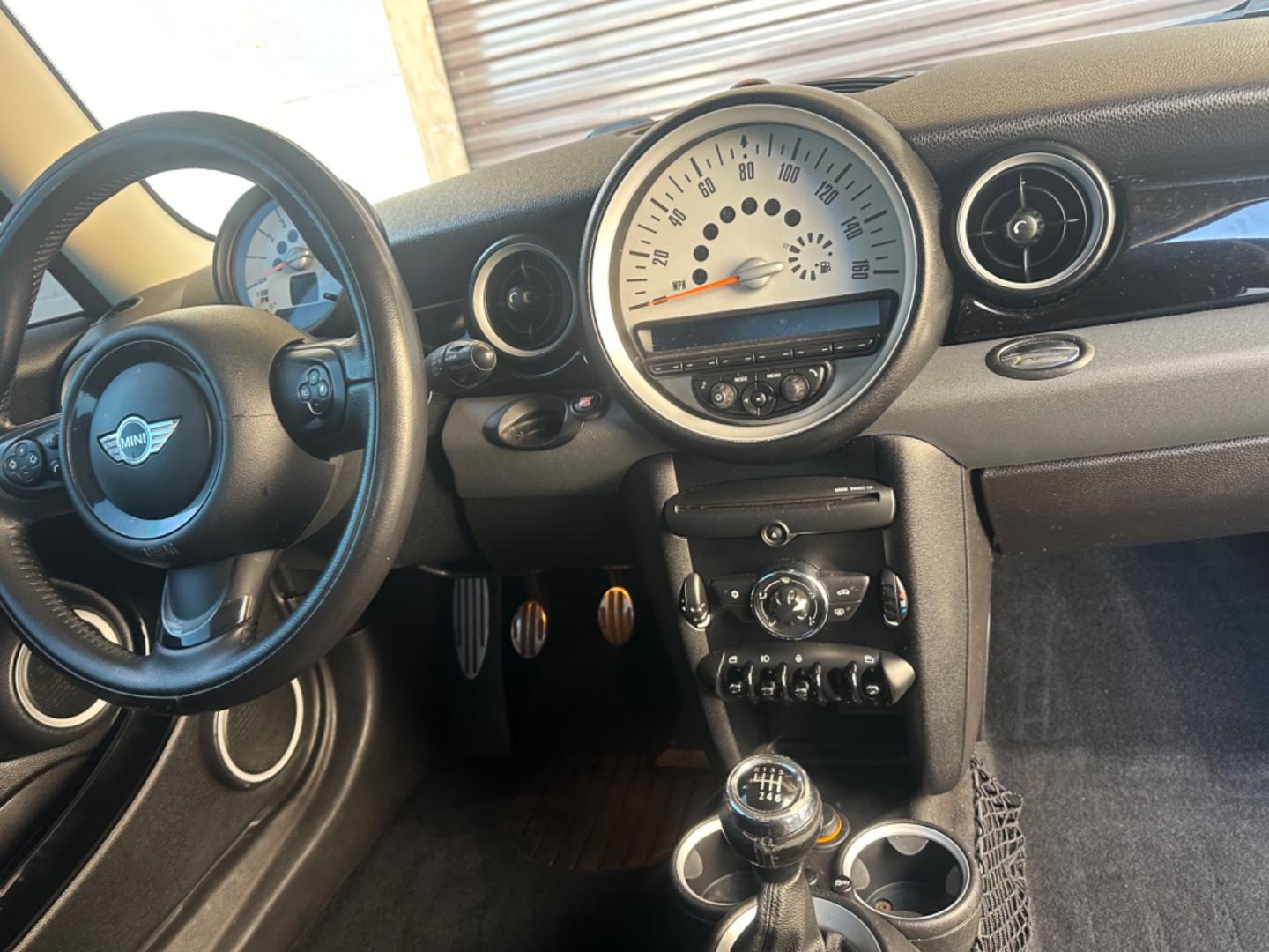 2012 Black /Black Mini Cooper Cloth (WMWSV3C52CT) with an 4Cylinder engine, Manual transmission, located at 30 S. Berkeley Avenue, Pasadena, CA, 91107, (626) 248-7567, 34.145447, -118.109398 - Tank : 13.20 Anti-Brake System : 4-Wheel ABS Steering Type : Rack & Pinion Front Brake Type : Disc Rear Brake Type : Disc Turning Diameter : 35.10 Front Suspension : Ind Rear Suspension : Ind Front Spring Type : Coil Rear Spring Type : Coil Tires : 195/55R16 Front Headroom : 38.80 Re - Photo#21